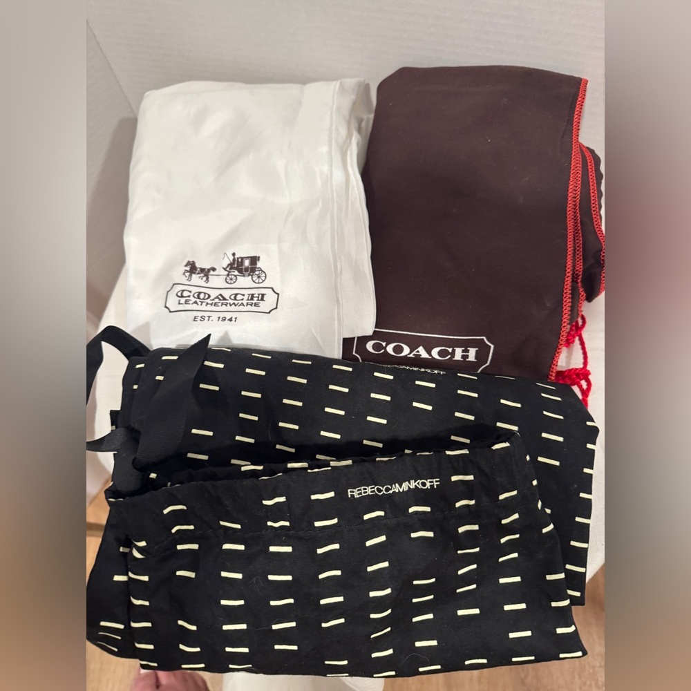 Three purse dust bags 2 -Coach and 1- Rebecca Minkoff